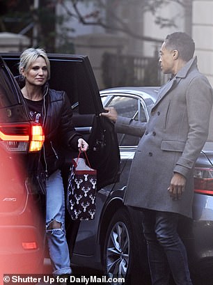 The two then reunited when their Uber arrived before heading to Holmes' apartment in Lower Manhattan in the black SUV