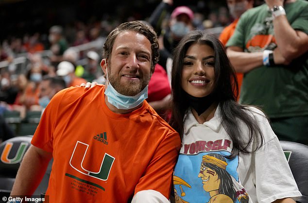 Portnoy, 46, posed with his ex-girlfriend Silvana Mojica at a Miami Hurricanes game last year