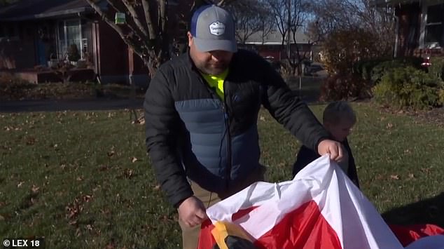 Nelson says neighbors have promised to help him repair the torn remains by Christmas