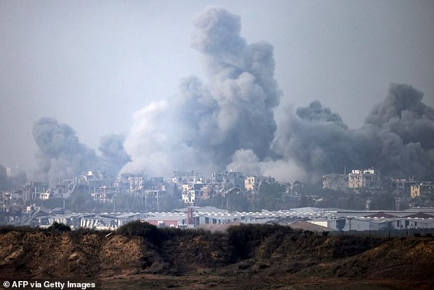 Smoke rises over the Palestinian enclave during the Israeli bombardment, amid ongoing fighting between Israel and Hamas