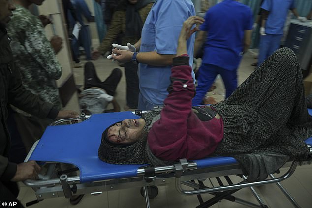 Palestinians injured in the Israeli bombardment of the Gaza Strip are taken to hospital in Deir al Balah
