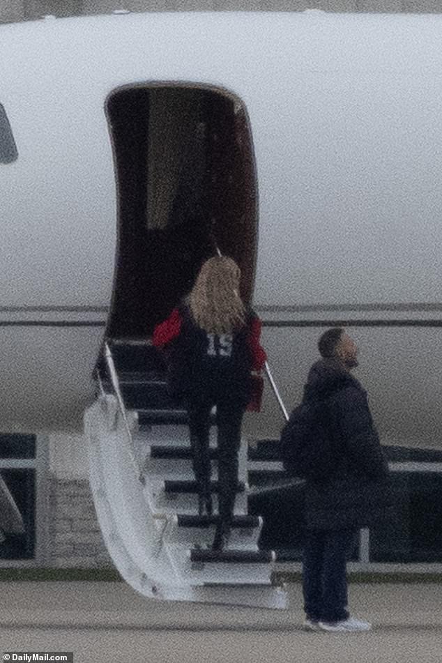 Brittany wore a black and red jacket with her husband's number 15 on the back