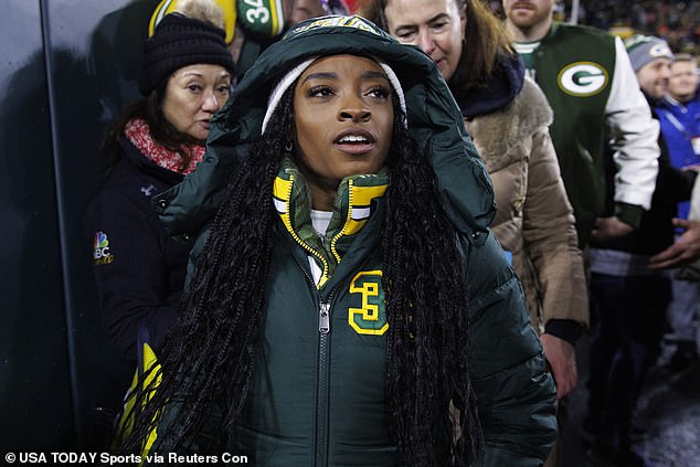 Simone spotted: The 26-year-old Olympic gymnast — who recently opened up about her struggles building a new home — was spotted on the sidelines at Lambeau Field in Green Bay