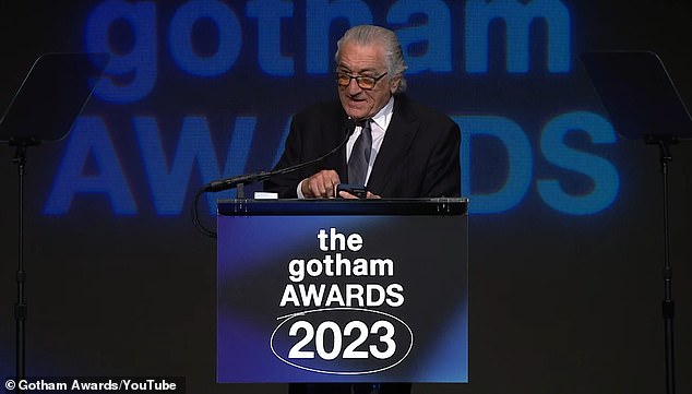 “I just want to say one thing,” De Niro said.  “The beginning of my speech was edited and excised, and I knew nothing about it.  And I want to read it before I start the speech