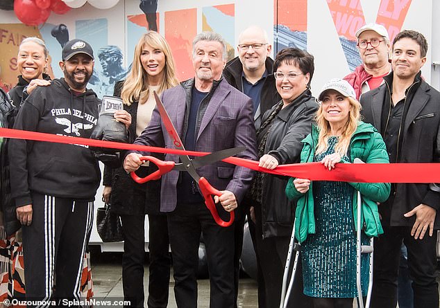 Stallone cut the ribbon as a store dedicated to Rocky memorabilia opened its doors