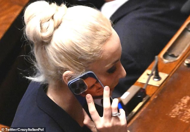 Forza Italia politician Marta Fascina pictured wearing her iconic Berlusconi phone case, undated
