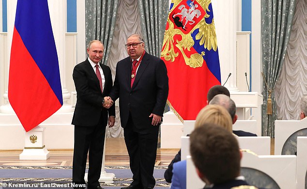 Russian oligarch Alisher Usmanov (R) – 82nd on the Bloomberg Billionaires Index, pictured with Vladimir Putin (L)