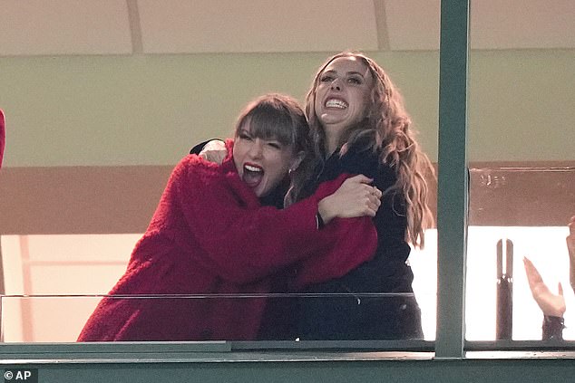 Kelce's current girlfriend Taylor Swift (L) cheering on the Chiefs with Brittany Mahomes (R)