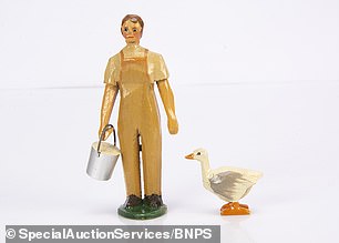 This figure of a girl with a bucket and a goose is expected to sell for £200