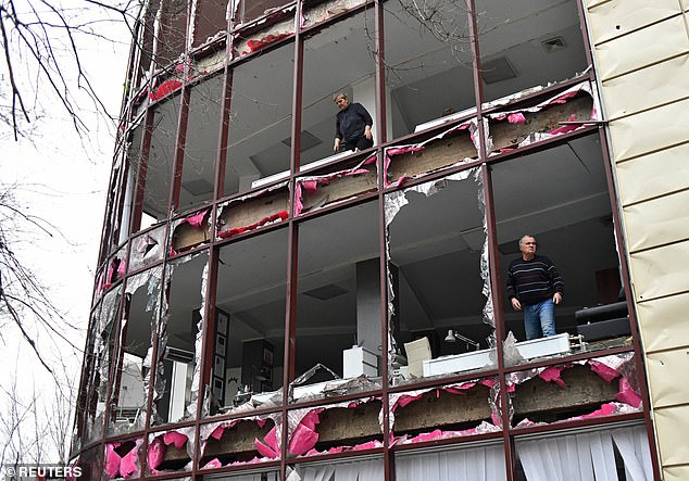 More Ukrainians continue to die every day in the Eastern European conflict that sparked when Russia invaded in February 2022.  Pictured: People removed rubble from a building hit by shelling in Donetsk, a Russian-controlled area of ​​Ukraine, on Sunday, December 3