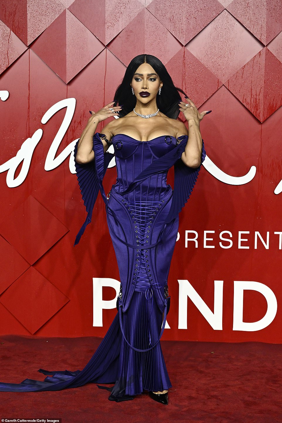 Munroe Bergdorf attends the 2023 Fashion Awards presented by Pandora at the Royal Albert Hall