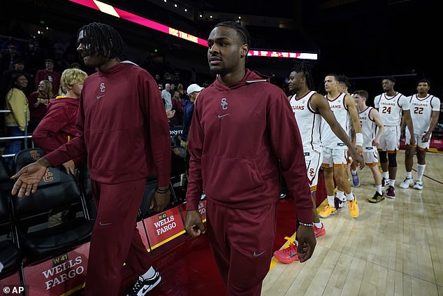 Bronny James walks through the handshake line after USC beat Eastern Washington