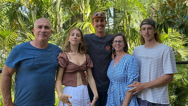 The family of Mr Taylor (centre) remain by his side in the hospital's ICU unit, where he remains in a critical condition