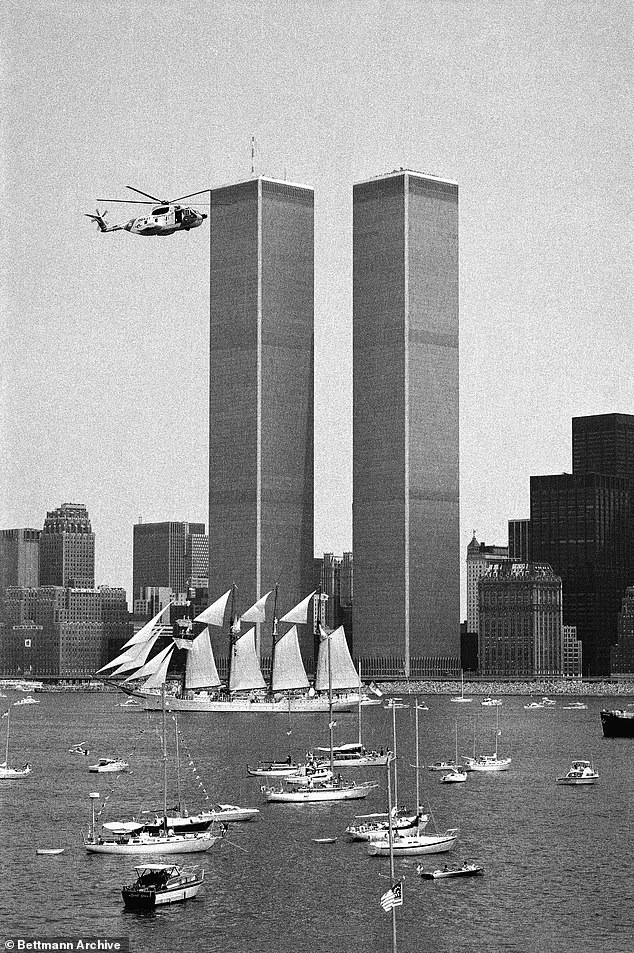 The Bicentennial Celebrations saw a fleet of ships sailing down the Hudson River – with photos including this one showing the ships in front of the now-destroyed Twin Towers