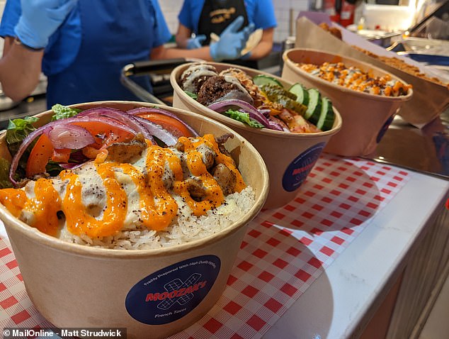 The counter at Moozak's shows off some of the dishes on offer.  Customers can choose their own fillings and sauces, or opt for one of the special boxes