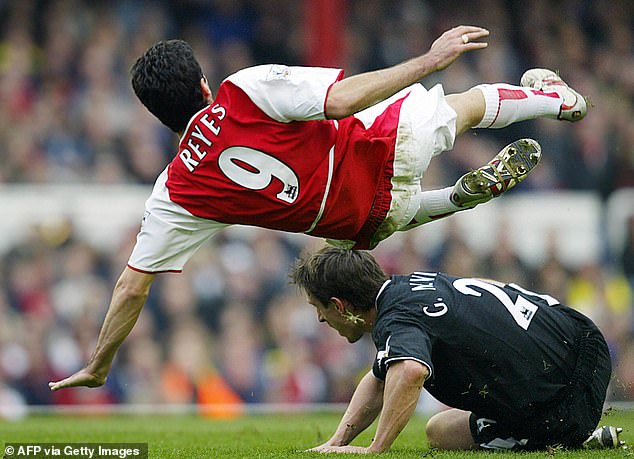 Vieira told Neville before the match that he was 'going to make it' after the former Manchester United right-back delivered a blistering tackle on Jose Antonio Reyes at Old Trafford in 2004.