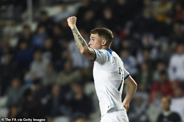 Devine celebrates his goal for England against Italy at the Under-20 World Cup in Argentina