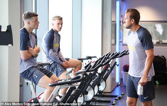 Chatting with Harry Kane during pre-season training in July before the striker's departure