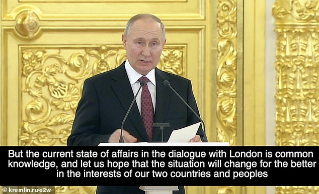 Putin spoke confidently in his opulent surroundings.  He told the envoys – including the new ambassadors of Germany and Australia: 'Unfortunately, for sanitary reasons we can no longer talk, socialize'