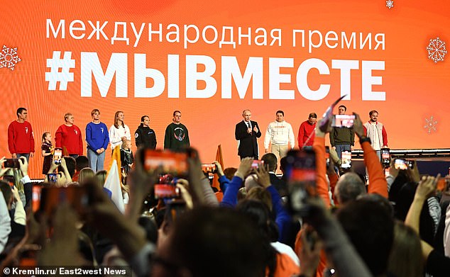 Putin seen in front of a crowd in a recent photo.  Putin told the envoys: 