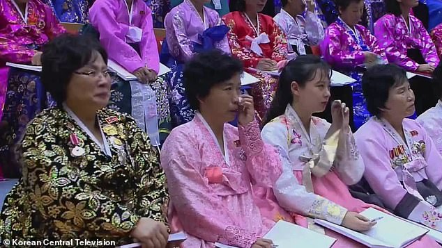 Many women in the audience (pictured) openly wept with their leader at the event, the first of its kind to be held in 11 years and taking place amid a decline in the isolationist state's birth rate.