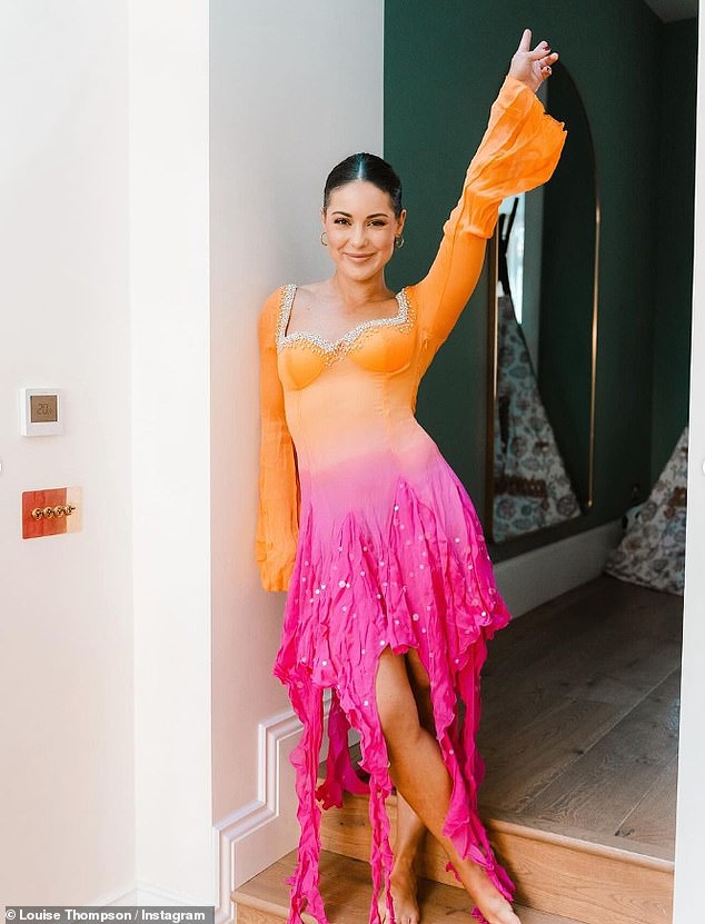 Sharing a gallery of photos of herself, Louise looked stunning as she dressed up in a striking dazzling orange and pink ombre long-sleeved number