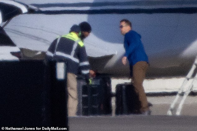 Handlers were seen loading her bags onto the plane, despite her plans to remain in Kansas City for the next few weeks