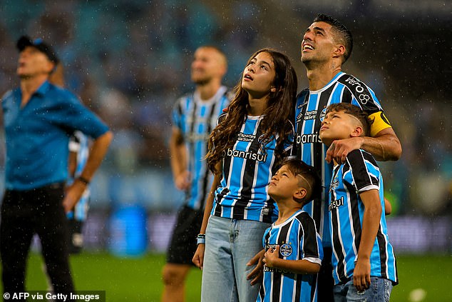 Suarez bid an emotional farewell to Gremio on Sunday as he prepared to leave the club