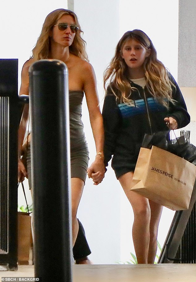 Gisele held her daughter's hand as they stepped out on her 11th birthday