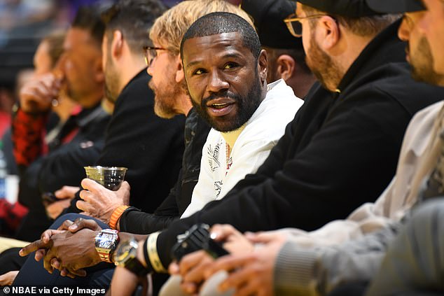 Boxer Floyd Mayweather was also in LA to see LeBron James and the Lakers in action