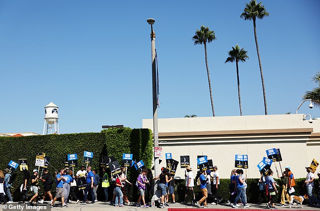 : Notable SAG-AFTRA members picket as WGA (Writers Guild of America) members march in solidarity outside Paramount Studios on October 2, 2023 in Los Angeles, California