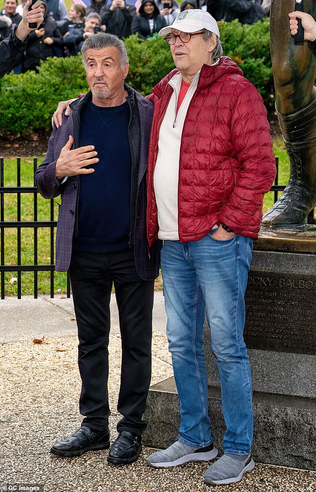 Chevy got out of his seat to take a picture with his friend Sylvester Stallone