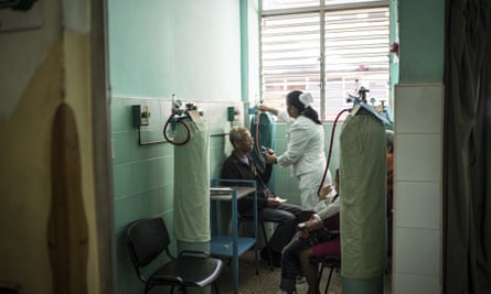 A nurse treats patients at the 19 de Abril Hospital in Havana.