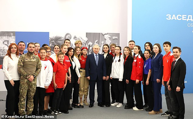 Putin was seen near dozens of people, including children, during a trip to a school in Pyatigorsk in the Vologda region