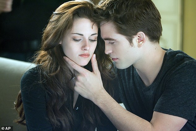 Throwback: Robert and Kristen dated 11 years ago, after rekindling a romance in the vampire movies (seen in a still from Twilight: Breaking Dawn)