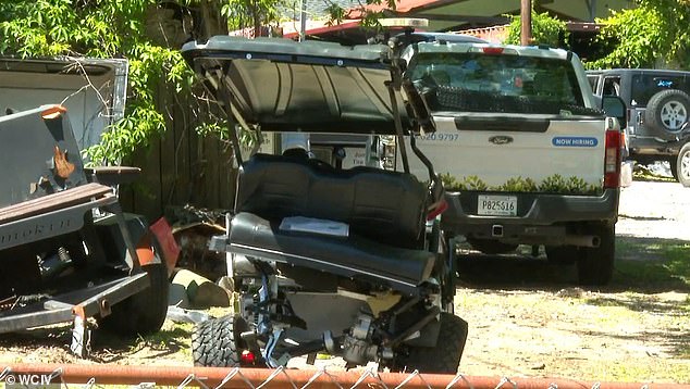 The mangled golf cart that Komoroski crashed into