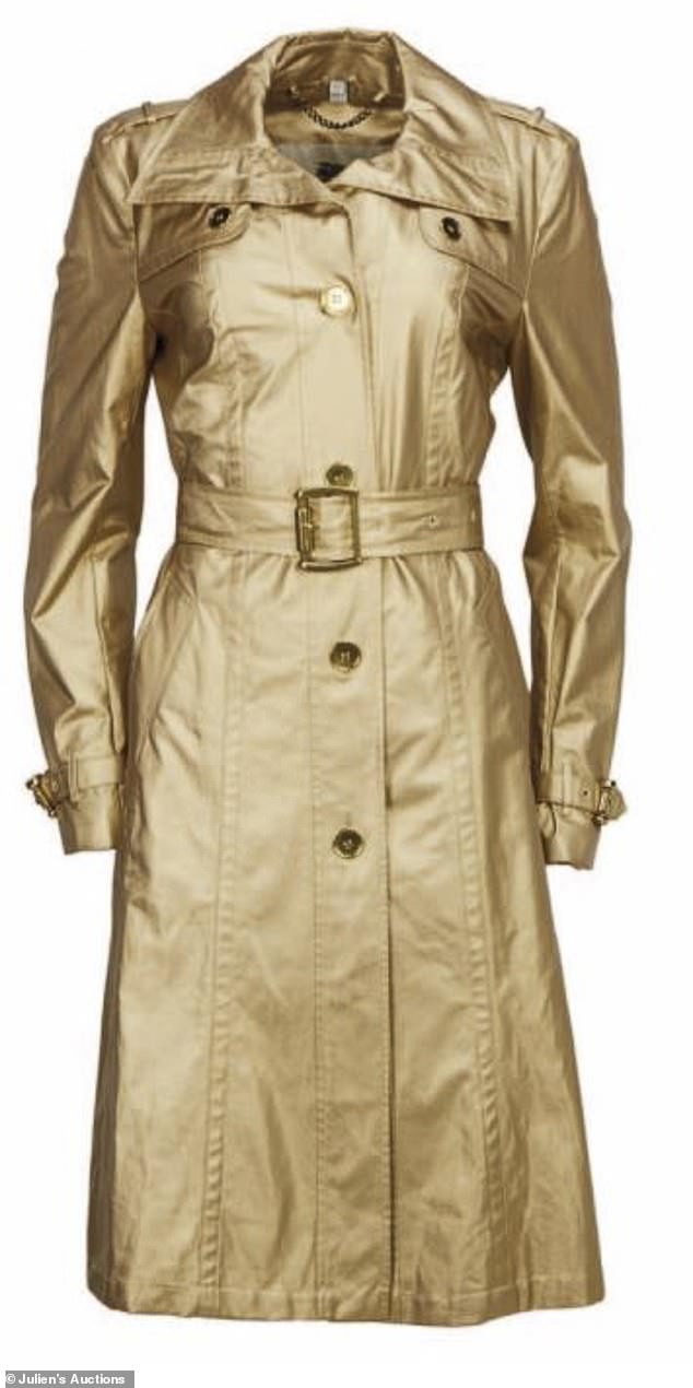 Whitney's coat: Also going under the hammer is a Burburry London trench coat with gold metallic coating, worn by Whitney Houston in 2008, which is expected to fetch between $3,000 and $4,000