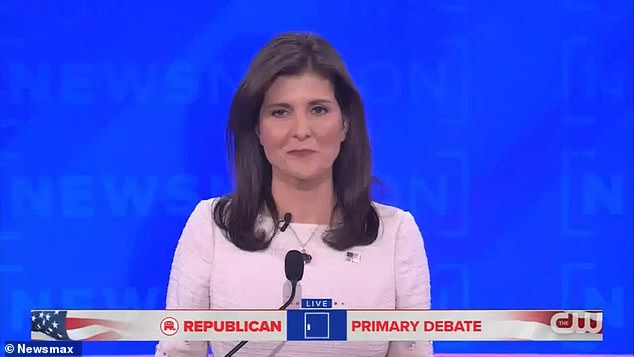 Former UN Ambassador.  Nikki Haley reacts as Ramaswamy was booed for holding up a notepad and calling her 'corrupt' during the GOP's fourth primary debate Wednesday