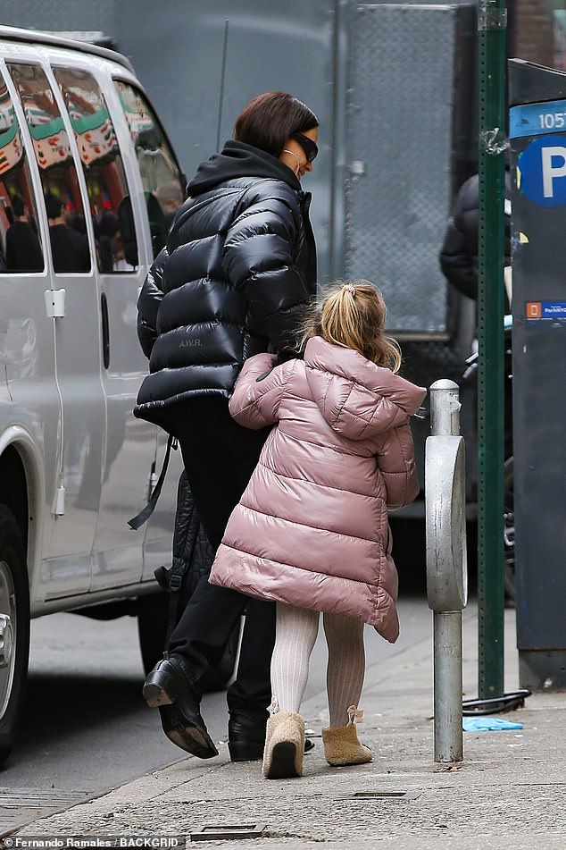 Sweet: The supermodel brought her and Cooper's six-year-old daughter to support her father