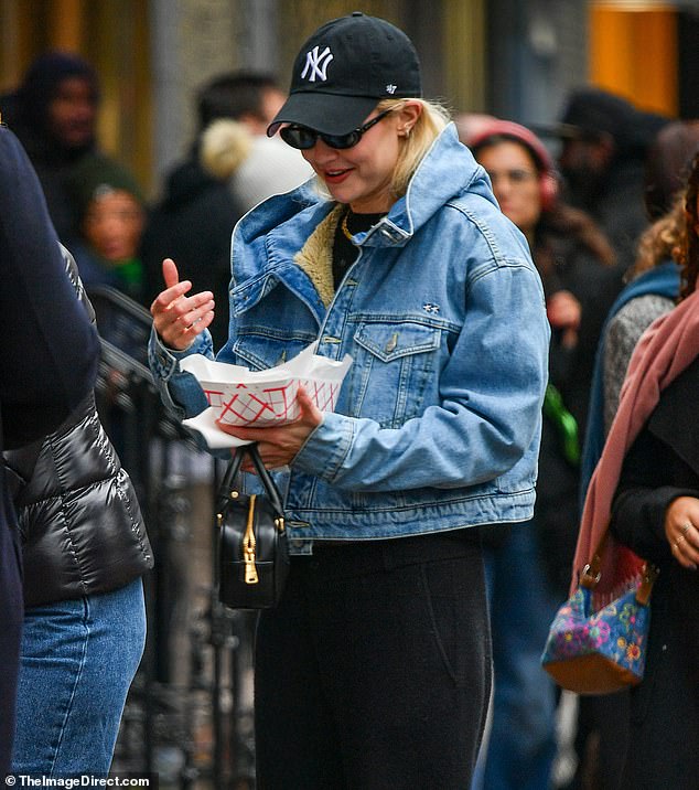 The supermodel seen with her food