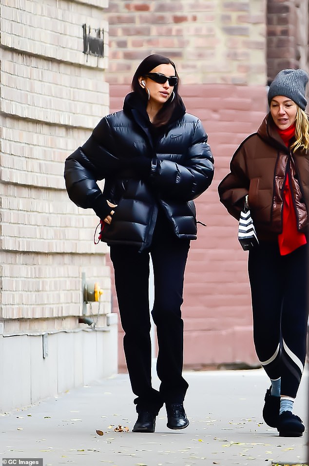 Irina looked every bit a supermodel as she walked to the food truck