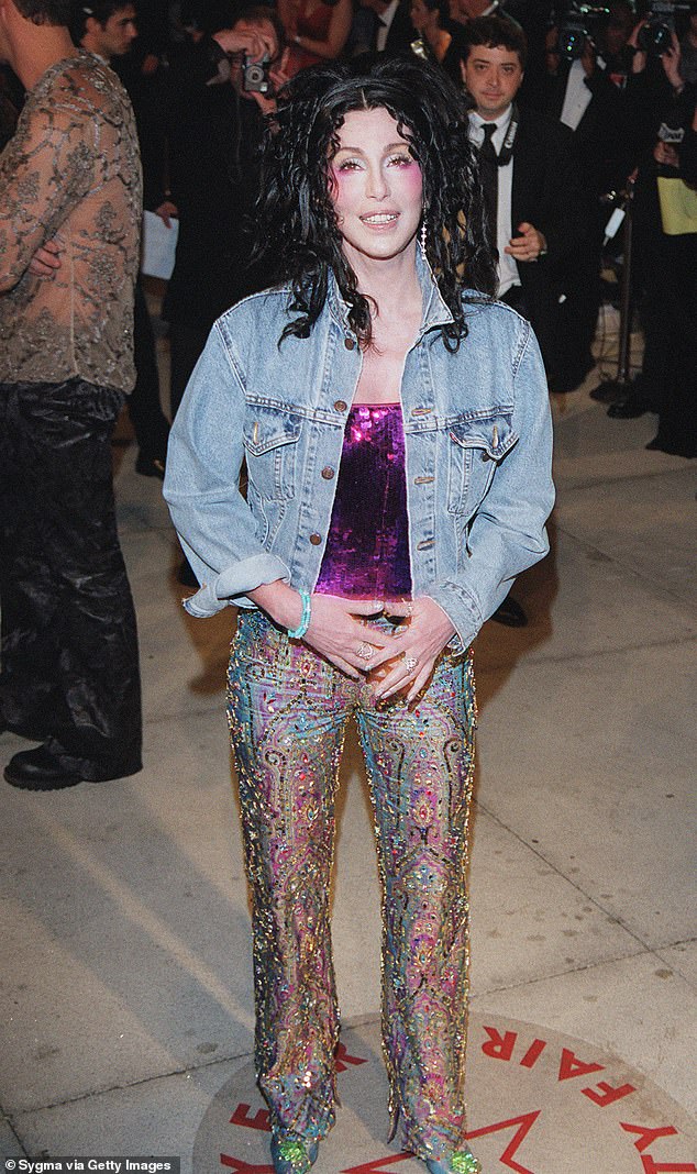 Cher's trousers: The trousers are described as 'peacock feather toned paisley-embellished brocade trousers with slits, embellished with faceted pastel-coloured prong-set stones and gold seed beads'