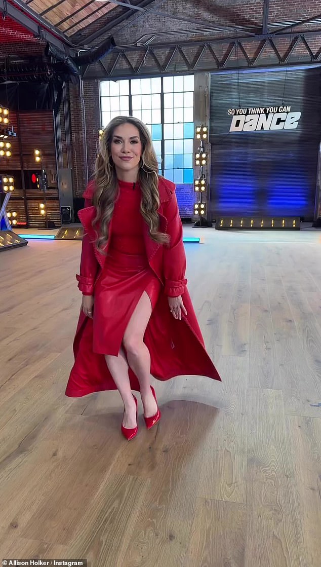 Holker was decked out in an all-red ensemble of a jacket, dress and heels as she danced in a studio in the online clip