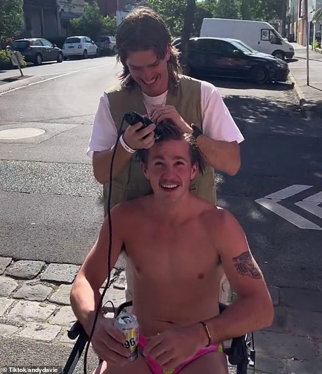 Clips of the 'garage session' (above) in Melbourne's trendy suburb of Fitzroy went viral, but some viewers accused the partying men of being fake