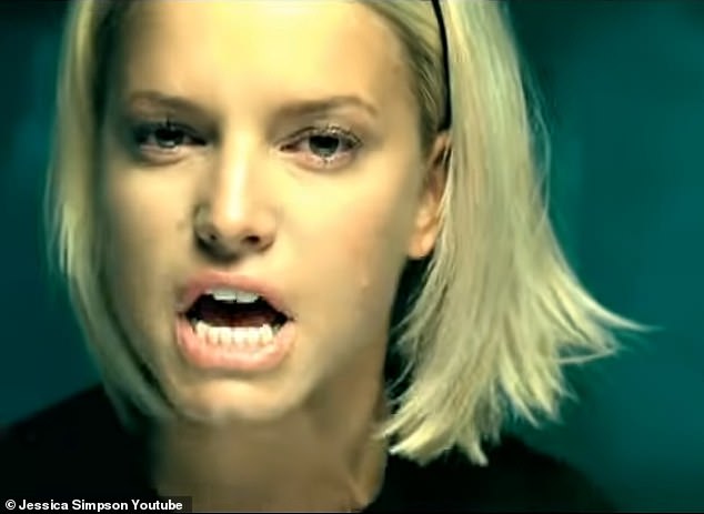 One of the singles was called I Belong to Me, and in the music video there is a scene where the singer performs while chopping off her long locks.