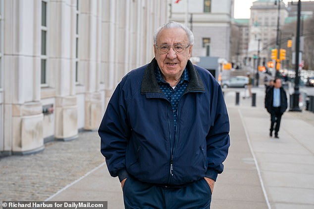 Cameras from DailyMail.com spotted Romanello entering Brooklyn Federal Court on Wednesday with his wife wearing a blue windbreaker