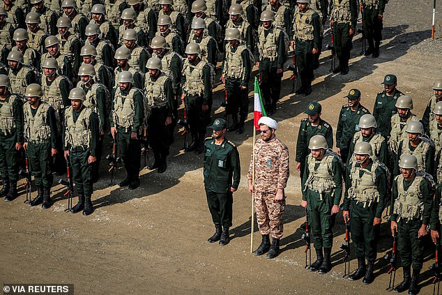 Members of the Islamic Revolutionary Guards Corps (IRGC) attend a military exercise of the IRGC ground forces in the Aras area, East Azerbaijan Province, Iran, October 17, 2022