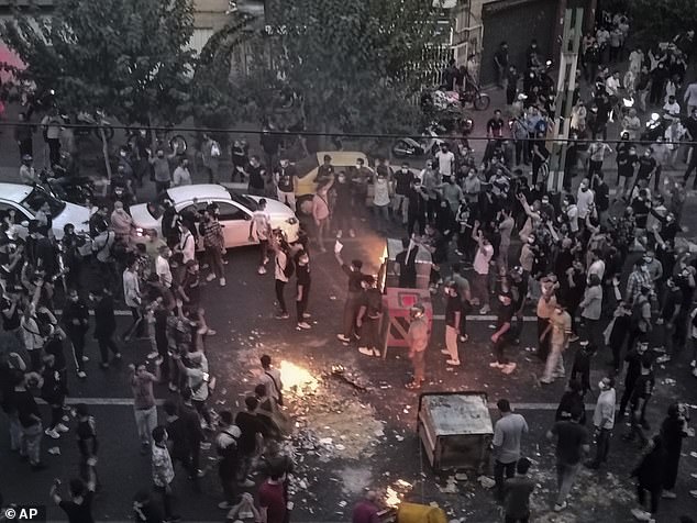 Iranians protest the death of a 22-year-old woman Mahsa Amini after she was detained by vice police, in Tehran, September 20, 2022