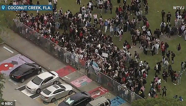 Hundreds of students at Monarch High School in Coconut Creek, Florida, flooded the football field in back-to-back demonstrations in support of their school principal