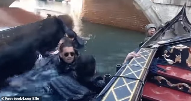 Some clung to another passing boat after falling into the canal near St. Mark's Square